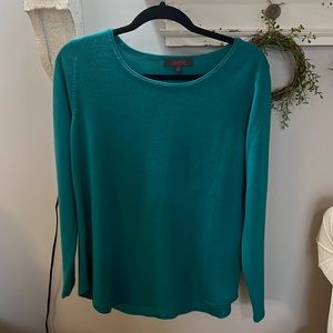 Worn twice, the color is a teal and is lighter in weight